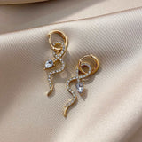 Snake Earrings golden – Posh Atomic